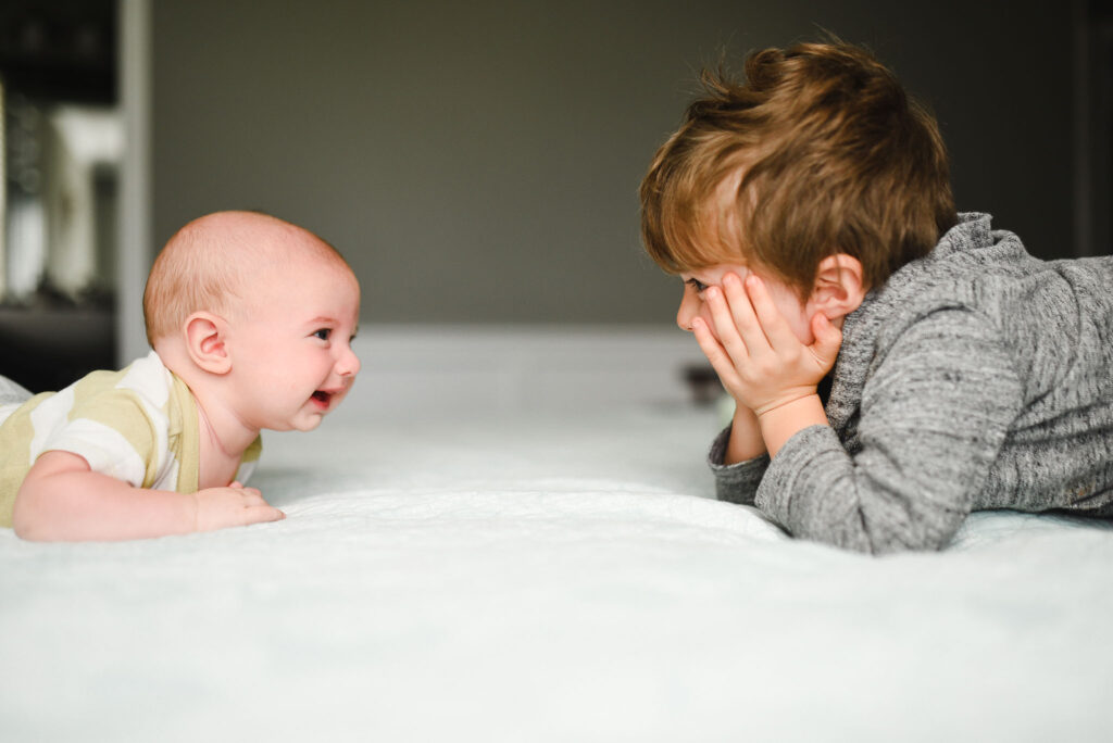 unwanted parenting advice baby and toddler playing peek a boo